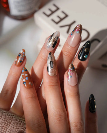Golden Kiss press on nails with raised gold spirals and flowers, inspired by Klimt