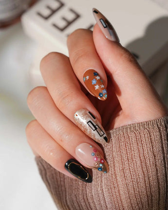 Golden Kiss press on nails with raised gold spirals and flowers, inspired by Klimt