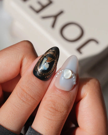 Pearl Earring press on nails with a gold-framed portrait and pearls, inspired by Vermeer