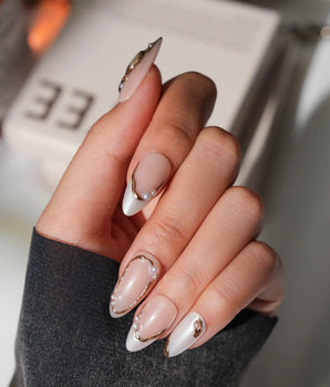 Baroque pearl press on nails with molten gold and real pearls on a nude base