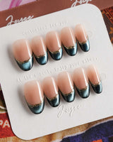 Malta Blue refined summer nails with rich blue tips, nude base, and gold line detail
