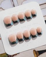 Malta Blue extra short coffin nails with magnetic blue French tips and nude base