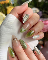 Marshes - Mud Masquerade nail art close-up showing Textured Herbal Green, Metallic Shell Patterns & Marble Smudge. details