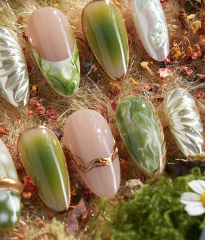 Marshes - Mud Masquerade handmade press-on nails featuring Textured Herbal Green, Metallic Shell Patterns & Marble Smudge.
