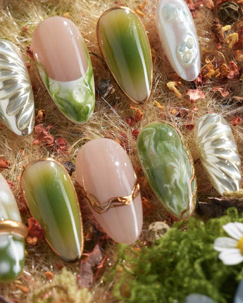 Marshes - Mud Masquerade handmade press-on nails featuring Textured Herbal Green, Metallic Shell Patterns & Marble Smudge.