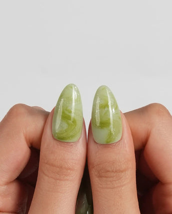 Matcha Chill custom-size medium almond nails with sheer milky green marble