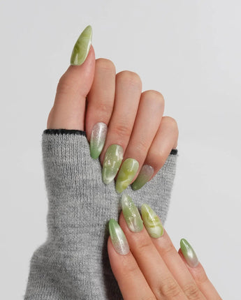 Matcha Chill medium almond nail set with one-of-a-kind green marble swirls