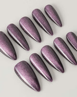 Mauve Nail Color Cat-eye nail art close-up showing dark purple cat eye nails details