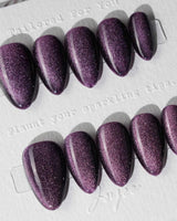 Mauve Nail Color Cat-eye press-on nails in extra short almond shape — dark purple cat eye nails