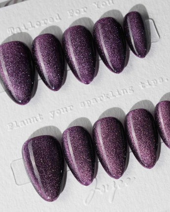 Mauve Nail Color Cat-eye press-on nails in extra short almond shape — dark purple cat eye nails