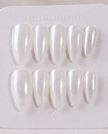 Clean Pearl press-on nails in medium almond shape — white chrome nails