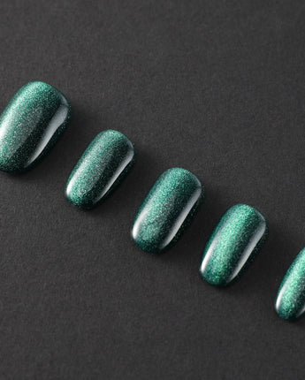 Emerald Green Nail Designs Cat-eye Nails press-on nails in medium oval shape — emerald green cat eye nails