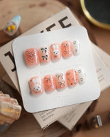 Miffy Sweetie press-on nails in extra short coffin shape — Sweet Pink-Orange, 3D Bunny & Silver Bows.