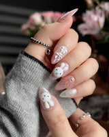 Miffy Sweetie handmade press-on nails featuring Sweet Pink-Orange, 3D Bunny & Silver Bows.