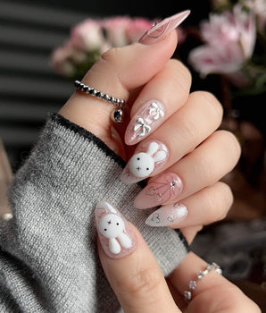 Miffy Sweetie handmade press-on nails featuring Sweet Pink-Orange, 3D Bunny & Silver Bows.