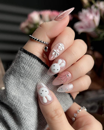 Miffy Sweetie handmade press-on nails featuring Sweet Pink-Orange, 3D Bunny & Silver Bows.