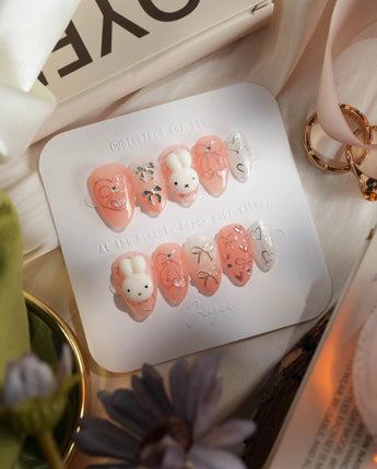 Miffy Sweetie press-on nail set — Sweet Pink-Orange, 3D Bunny & Silver Bows. design, hand-painted with real gel polish