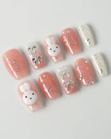 Miffy Sweetie press-on nails in short coffin shape — Sweet Pink-Orange, 3D Bunny & Silver Bows.