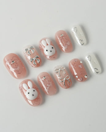 Miffy Sweetie press-on nails in short oval shape — Sweet Pink-Orange, 3D Bunny & Silver Bows.