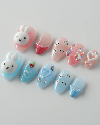 MIFFY XOXO press-on nails in extra short almond shape — cute nails miffy
