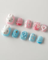 MIFFY XOXO press-on nails in extra short squoval shape — cute nails miffy