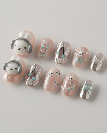 Miffy's Vacay extra short oval nails with 3D rabbit accent and silver chrome