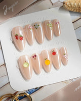 Mini Fruit nude chrome press-on nails with sculpted candy fruit details