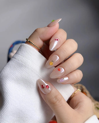 Mini Fruit glossy nude press-on nails with playful miniature fruit details