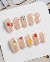 Mini Fruit handmade press-on nails with nude chrome base and fruit art