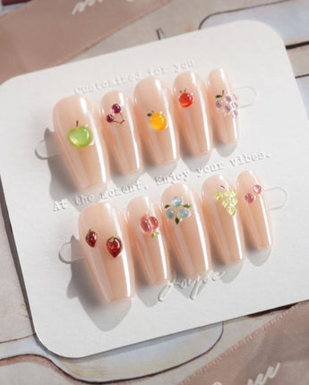 Mini Fruit playful minimalist nails with tiny 3D fruit pieces and glossy gel