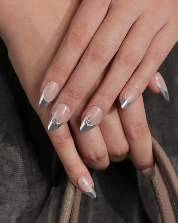 Minimal chrome French nails with glossy finish