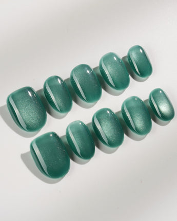 Mint Orb press-on nails in extra short oval shape — Glacier Green Cat Eye