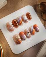 Mischief Maker nails — nude base orange gradient by Joyee Nails