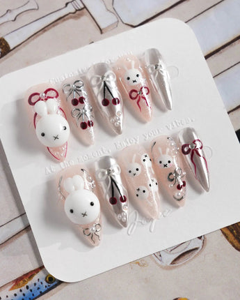 Miss Miffy medium stiletto press-on nails with 3D rabbit, cherries and silver metallic accents