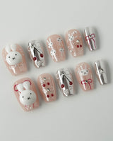 Miss Miffy short coffin press-on nails with nude base, 3D rabbit and cherry details