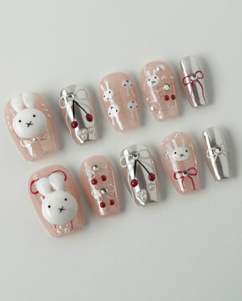 Miss Miffy short coffin press-on nails with nude base, 3D rabbit and cherry details