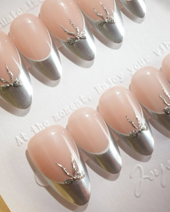 Modern silver French tips with bow accents
