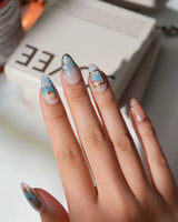 Monet Sunrise custom size press-on nails in short almond with hand-painted sunrise scene