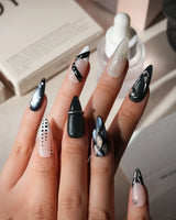 Monochrome press on nails mixing black and white marble, liquid chrome, polka dots, silver beads and a chrome bar across ten nails - image 2