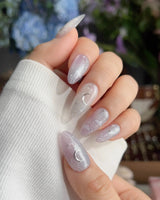 Moonrest dreamy night nails with pale pink gradient, sparkle, and moon motif