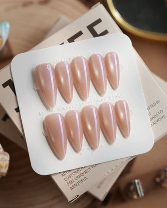 Moonstone press-on nails in medium stiletto shape — pearl lavender cat eye shimmer