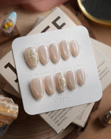 Morning Air press-on nails in extra short almond shape — Fresh Creamy Nude, Hand-painted Metallic Daisies & Simple gold Wire.