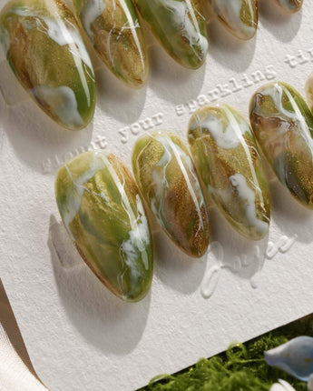 Mosses - Nightlight Moss nail art close-up showing Vintage Herbal Green, Marble Texture & Gold Foil Accents. details
