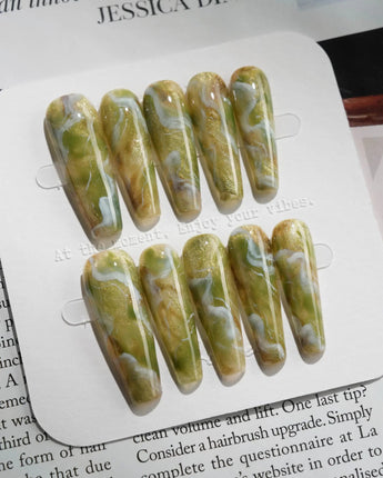 Mosses - Nightlight Moss press-on nails in long coffin shape — Vintage Herbal Green, Marble Texture & Gold Foil Accents.