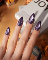 Mulberry leopard cat eye press on nails, cool plum base with a lilac shimmer band and hand-painted black leopard spots - image 1