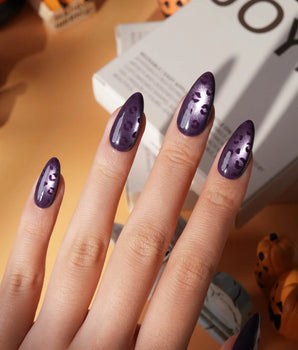 Mulberry leopard cat eye press on nails, cool plum base with a lilac shimmer band and hand-painted black leopard spots - image 1