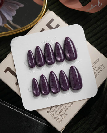 Mulberry leopard cat eye press on nails, cool plum base with a lilac shimmer band and hand-painted black leopard spots - image 2