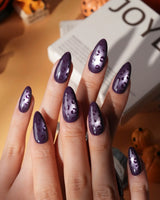 Mulberry leopard cat eye press on nails, cool plum base with a lilac shimmer band and hand-painted black leopard spots - image 3