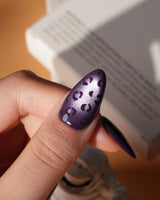 Mulberry leopard cat eye press on nails, cool plum base with a lilac shimmer band and hand-painted black leopard spots - image 4