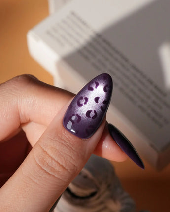 Mulberry leopard cat eye press on nails, cool plum base with a lilac shimmer band and hand-painted black leopard spots - image 4